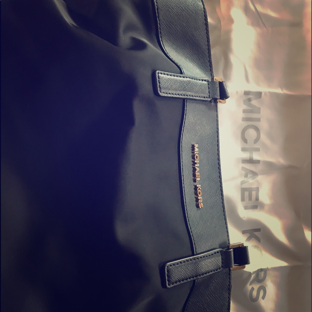 Large Michael Kors purse.